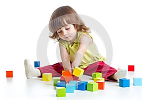 kid girl playing building block toys