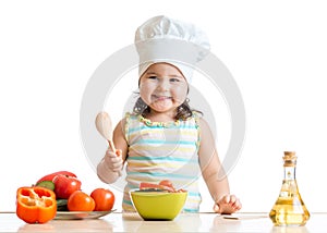 Kid girl preparing healthy food