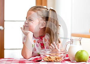 Kid girl refuses to eat healthy food