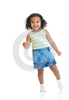 Kid girl standing or dancing full length isolated