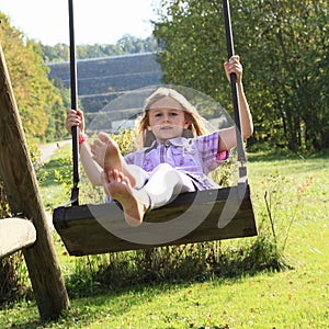 Kid - girl on swing