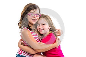 Kid girls tender hug smiling ans friends cousins