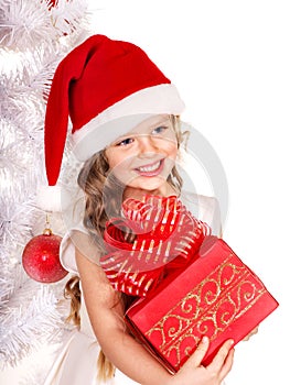 Kid giving Christmas gift box.