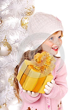 Kid with gold Christmas gift box.