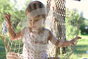 Kid in hammock on nature