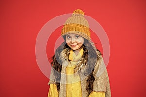 kid with happy face wearing warm winter clothing and get ready for holidays, cold weather