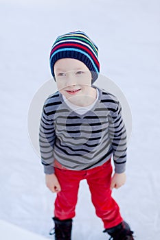 Kid ice skating