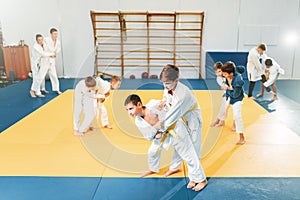 Kid judo, childrens training, self-defense photo