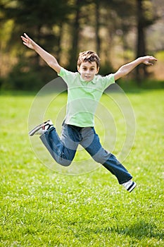 Kid jumping for joy