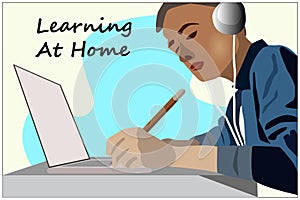 Kid learning at home with computer and headphone