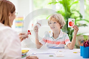 Kid learning to read. Phonics flash cards