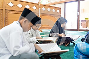 Kid learning to read quran