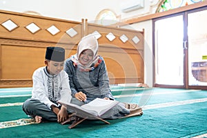 Kid learning to read quran