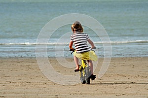 Kid learning to ride