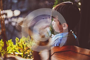 Portraits of people thinking. Kid looking out window.