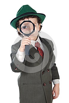 Kid with magnifying glass