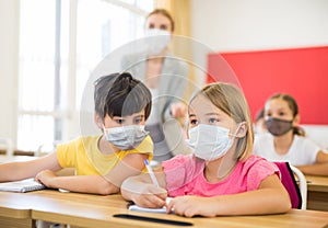 Kid in mask cheating during test