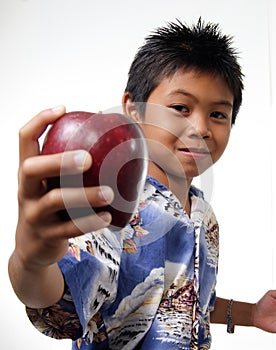 Kid offering apple