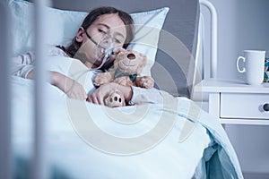 Kid with oxygen mask