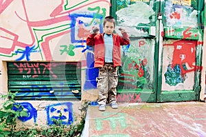 Kid painting graffiti