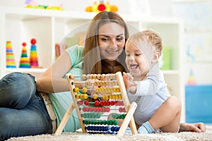 Kid playing with abacus