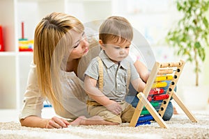 Kid playing with abacus