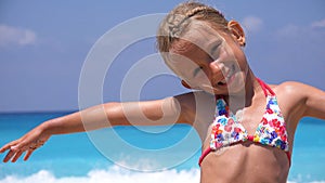 Kid Playing on Beach in Sunset, Child Face Watching Sea Waves, Girl Portrait on Shore, Ocean View