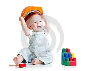 Kid playing with building blocks toy