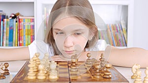 Kid Playing Chess in Library, Child Practicing Learning Girl Studying Brain Game