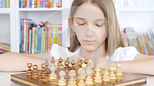 Kid Playing Chess in Library, Child Practicing Learning Girl Studying Brain Game