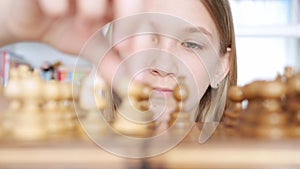 Kid Playing Chess in Library, Child Practicing, Learning, Teenager Blonde Girl Studying Brain Game