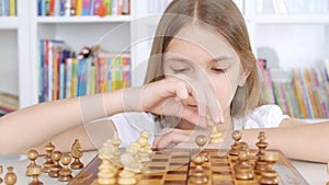 Kid Playing Chess in Library, Child Practicing, Learning, Teenager Blonde Girl Studying Brain Game