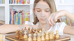Kid Playing Chess in Library, Child Practicing, Learning, Teenager Girl Studying