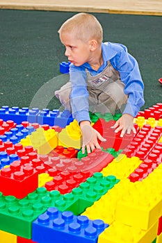Kid playing with cubes