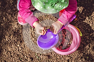 Kid playing with dirt