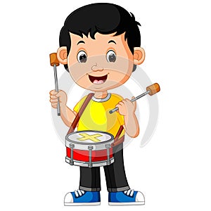 Kid Playing with a Drum