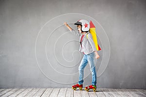 Kid playing with jet pack at home