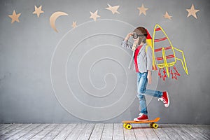 Kid playing with jet pack at home