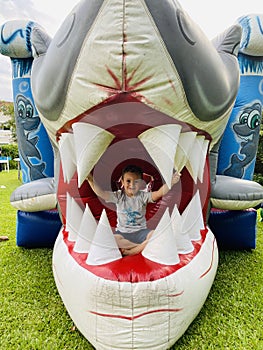 Kid playing in a shark