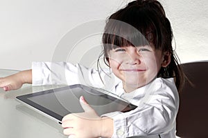 Kid playing Tablet