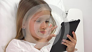 Kid Playing Tablet in Bed, Child Browsing Internet on Touchscreen Smartphone, Girl Portrait Not Sleeping Relaxing on PC