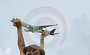 Kid playing with toy airplane. Kids playing with toy airplane