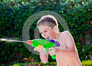 Kid playing with water toys