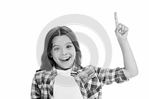 Kid point finger up isolated white. Child cute face brunette hair pointing upwards. Girl casual look recommend check