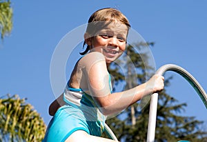 Kid on the Pool Slide