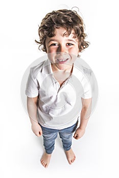 Kid portrait with curly hair on studio