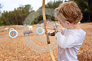 Kid practicing archery