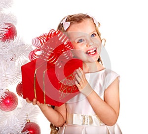 Kid with red Christmas gift box.