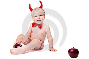 Kid in red suit of tempting devil photo