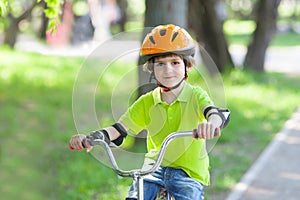 Kid rides a bicycle